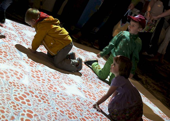 Touchable floor for kids with an integration game